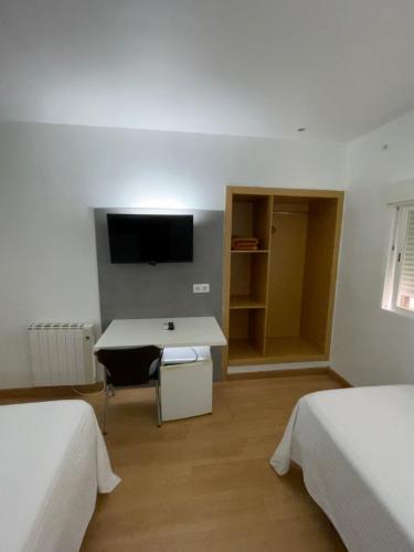 Habitación Triple del hotel Condedu Badajoz. Foto 9