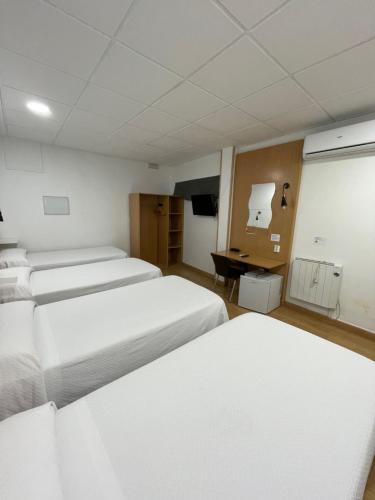 Habitación Cuádruple del hotel Condedu Badajoz. Foto 1