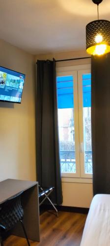 Habitación Deluxe del hotel Hôtel Royal Montreuil. Foto 7