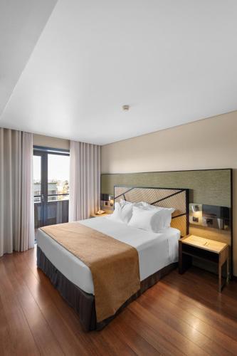 Oferta Especial - Habitación Doble 1 o 2 camas con paquete romántico del hotel Axis Porto Business and Spa. Foto 6