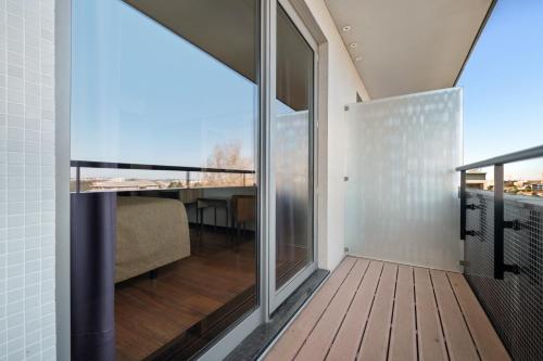 Habitación Doble con balcón - 2 camas del hotel Axis Porto Business and Spa. Foto 1