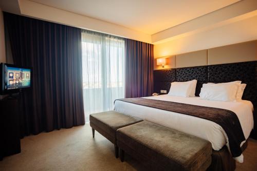 Suite del hotel Axis Porto Business and Spa. Foto 3