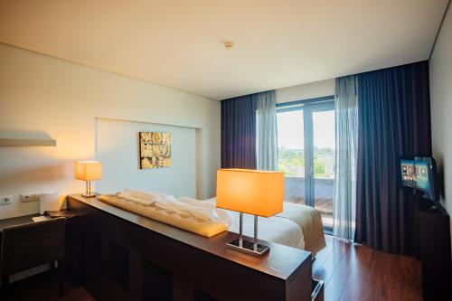 Habitación Familiar del hotel Axis Porto Business and Spa. Foto 2