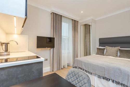 Suite estudio clásica del hotel Cleveland Residences Chelsea. Foto 1