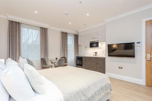 Suite Estudio Deluxe con vistas al jardín del hotel Cleveland Residences Chelsea. Foto 4