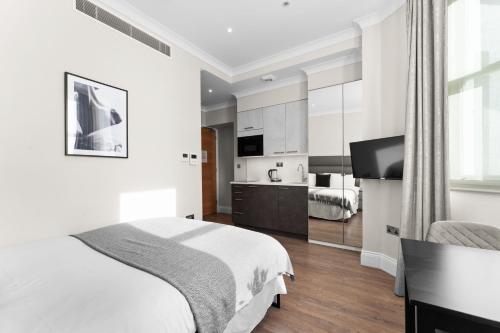 Suite Estudio Deluxe con vistas al jardín del hotel Cleveland Residences Chelsea. Foto 10