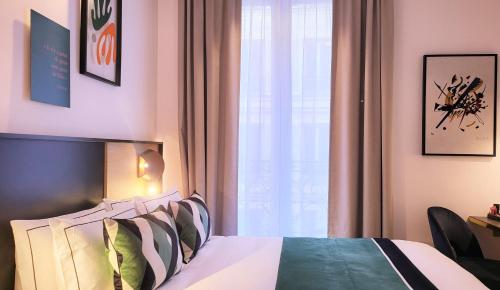Habitación Doble del hotel Star Champs Elysées. Foto 1