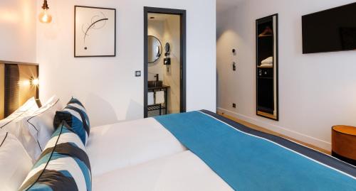 Habitación Doble con acceso a la piscina - 2 camas del hotel Star Champs Elysées. Foto 2