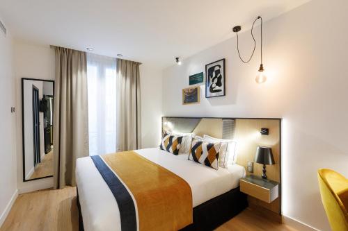 Habitación Doble Deluxe con acceso a la piscina del hotel Star Champs Elysées. Foto 1