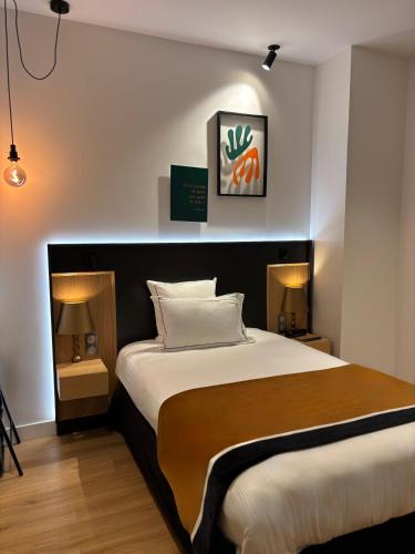 Habitación Individual adaptada para personas con movilidad reducida del hotel Star Champs Elysées. Foto 5