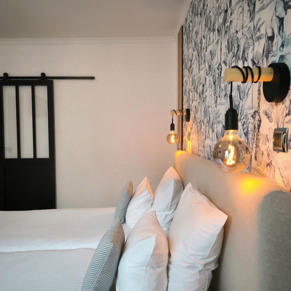 Habitación superior con 2 camas individuales del hotel Le Twelve. Foto 1