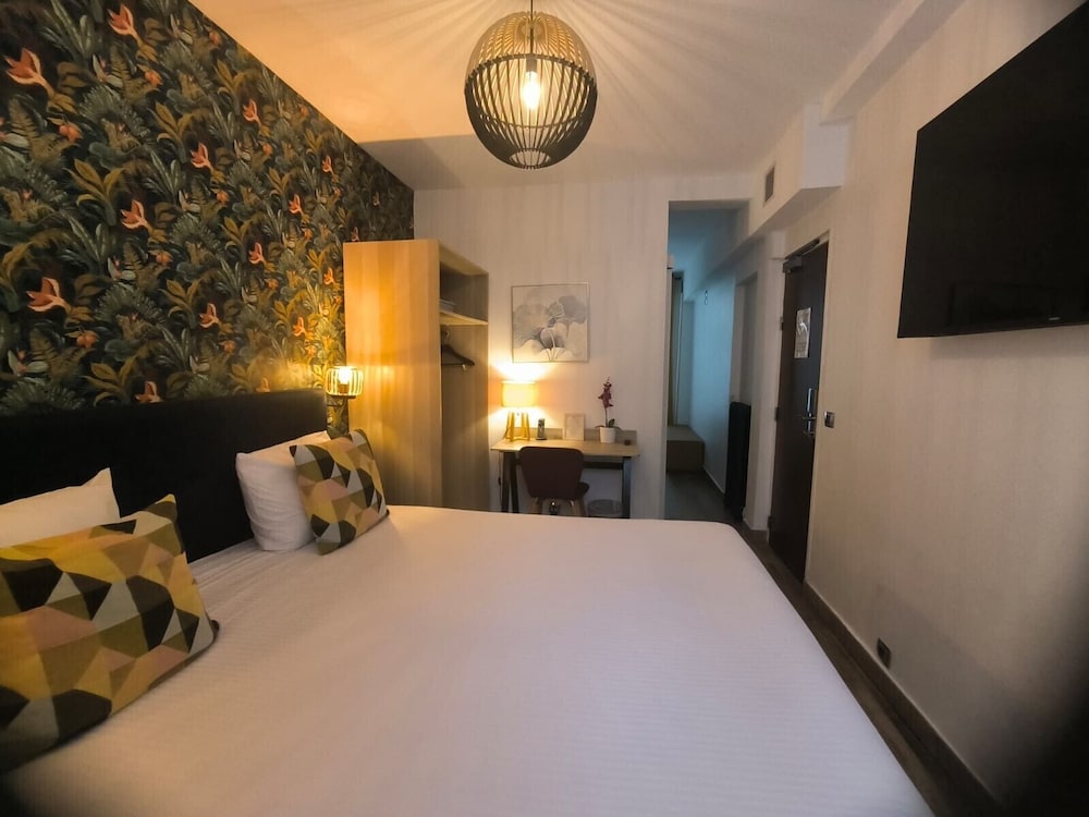 Habitación cuádruple Confort del hotel Le Twelve. Foto 1