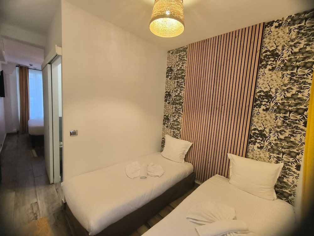 Habitación cuádruple Confort del hotel Le Twelve. Foto 2