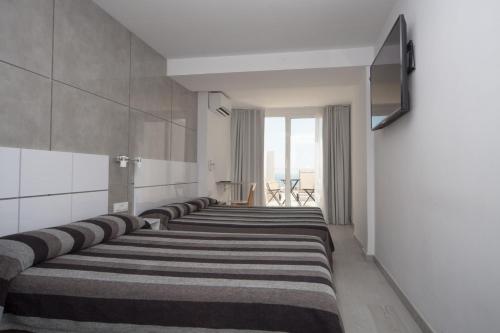 Habitación Cuádruple con vistas al mar del hotel Sol Playa. Foto 1