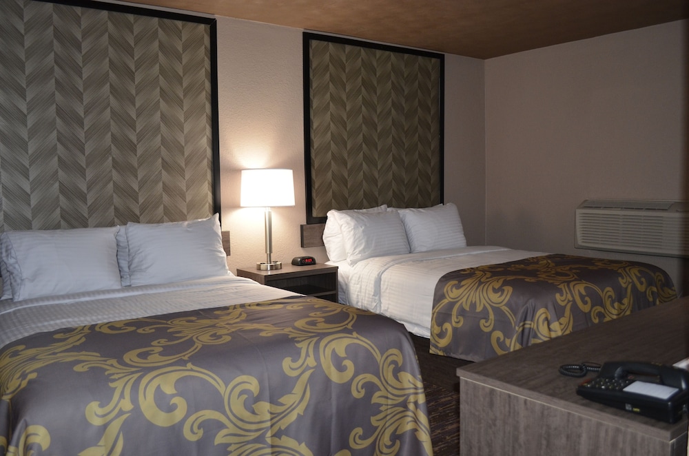 Habitación, 2 camas de matrimonio del hotel AArya By Niagara Fashion Outlets. Foto 6