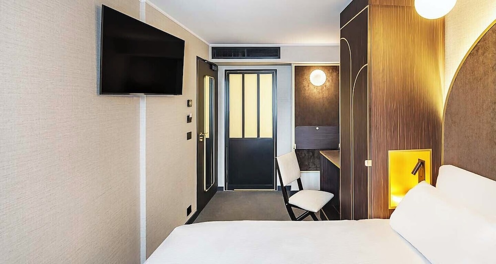 Habitación superior, 2 camas individuales, no fumadores del hotel Best Western Bretagne Montparnasse. Foto 3
