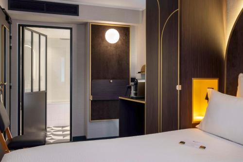 Habitación Superior Twin - No fumadores del hotel Best Western Bretagne Montparnasse. Foto 1