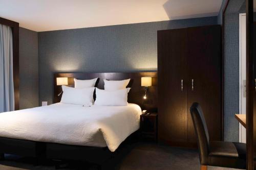 Habitación Deluxe King ampliada con sofá cama - No fumadores del hotel Best Western Bretagne Montparnasse. Foto 1