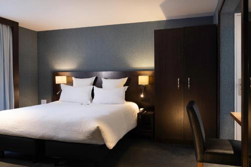 Habitación Deluxe King ampliada con sofá cama - No fumadores del hotel Best Western Bretagne Montparnasse. Foto 3