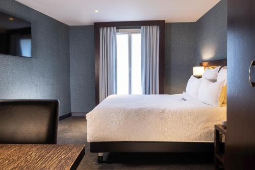 Habitación Deluxe King ampliada con sofá cama - No fumadores del hotel Best Western Bretagne Montparnasse. Foto 4