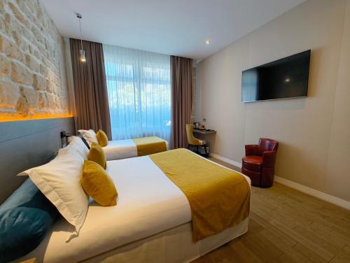 Habitación Triple Clásica del hotel Familia. Foto 9