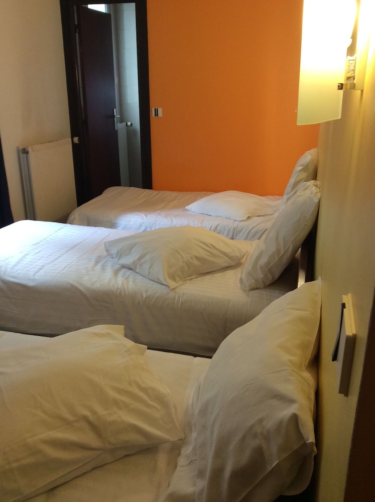 Habitación Triple del hotel De La Place
