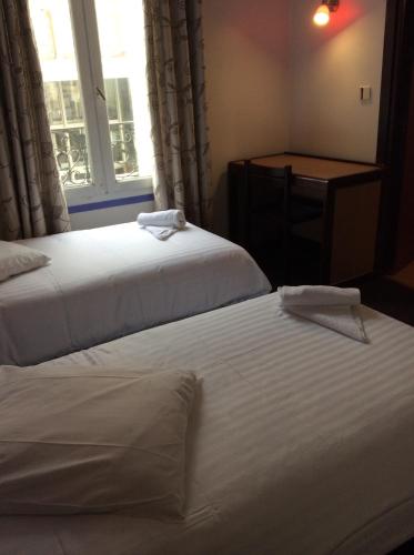 Habitación Doble - 2 camas del hotel De La Place. Foto 16