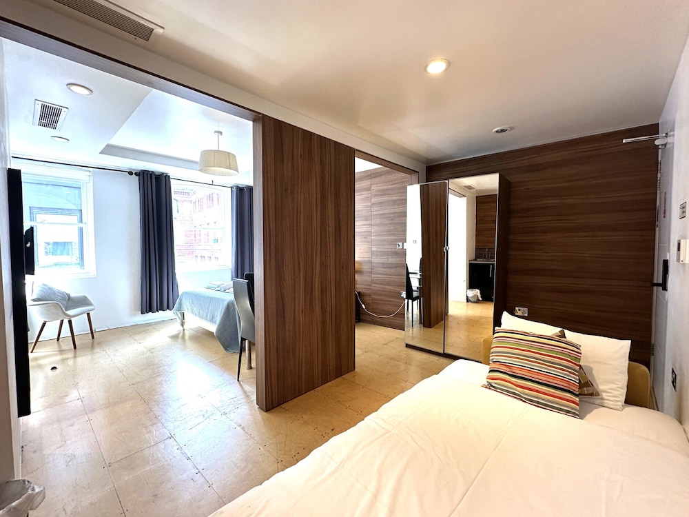 Estudio Deluxe, baño privado (Rodger Studio) del hotel Room Home Stay