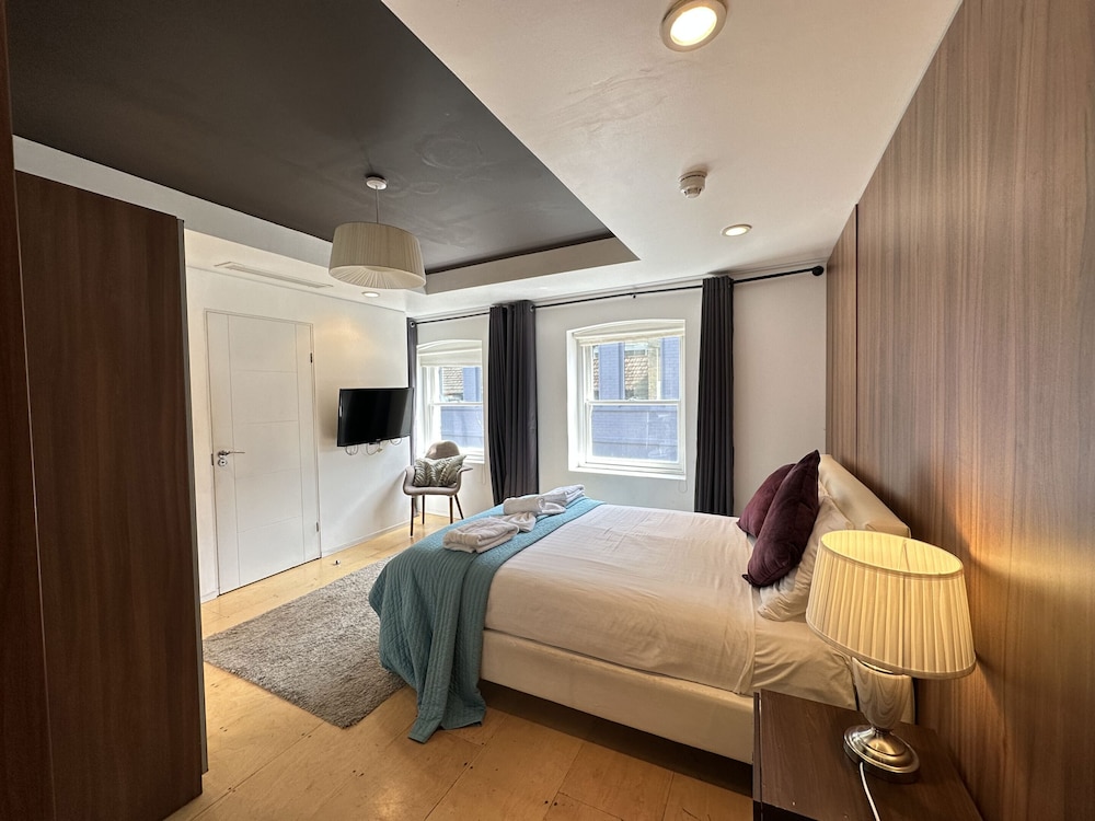 Estudio Deluxe, baño privado (Stark Studio) del hotel Room Home Stay. Foto 1