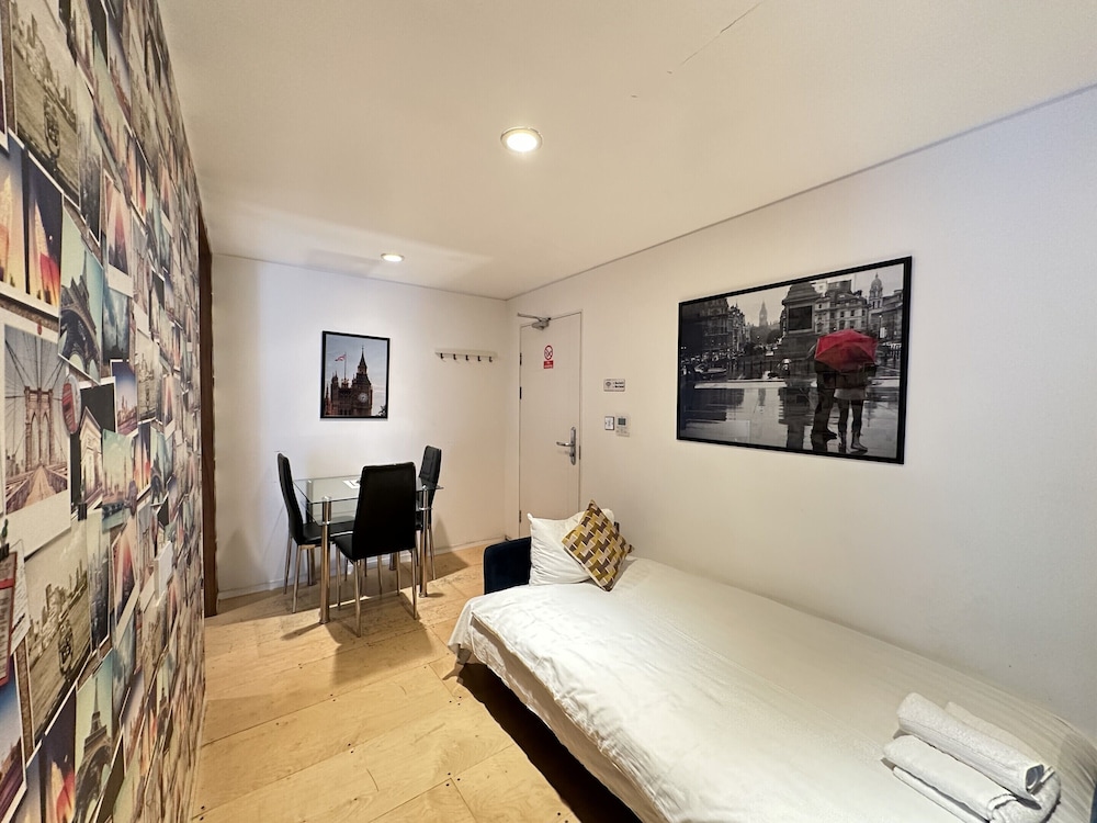 Estudio Deluxe, baño privado (Stark Studio) del hotel Room Home Stay. Foto 4