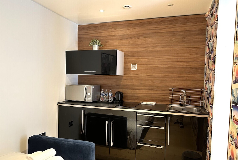 Estudio Deluxe, baño privado (Stark Studio) del hotel Room Home Stay. Foto 11