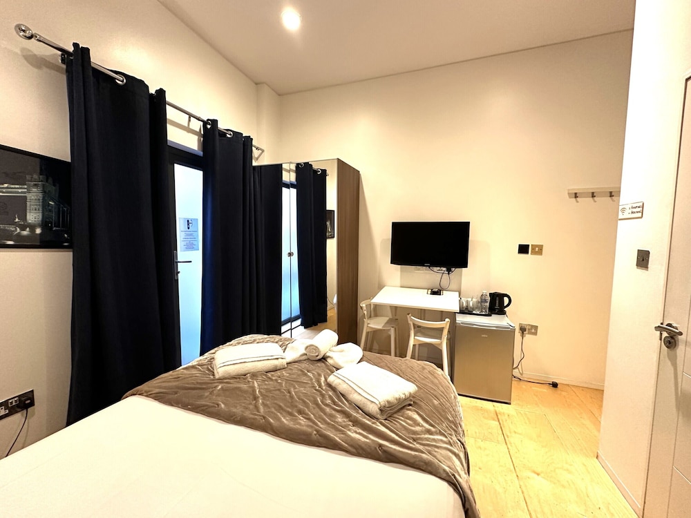 Suite económica, baño privado (Jacobson Suite) del hotel Room Home Stay. Foto 4