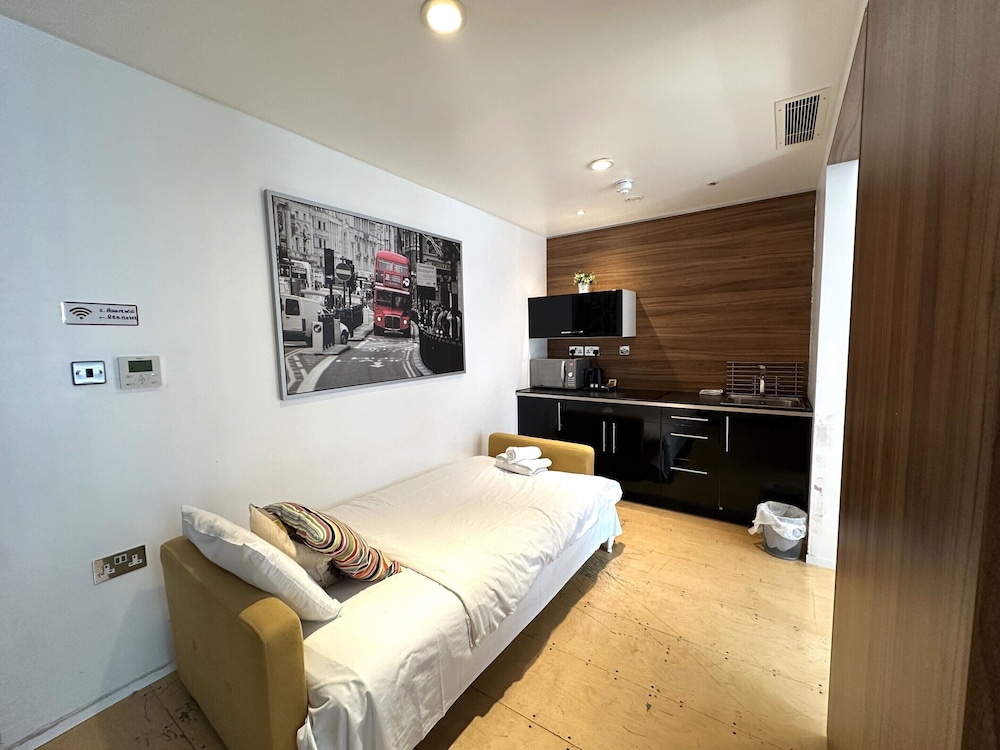 Estudio Deluxe, baño privado (Rodger Studio) del hotel Room Home Stay. Foto 11