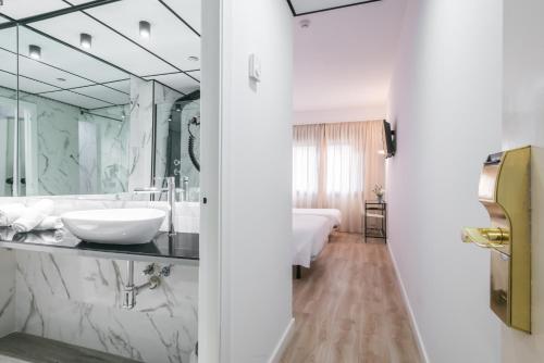 Habitación Triple del hotel Sansi Park. Foto 7