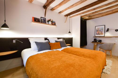 Habitación Deluxe del hotel Hôtel Victoire and Germain. Foto 1