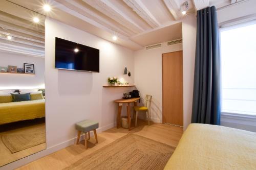 Habitación Clásica del hotel Hôtel Victoire and Germain. Foto 6