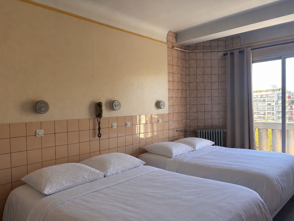 Habitación Familiar del hotel Hôtel de la Comète. Foto 1