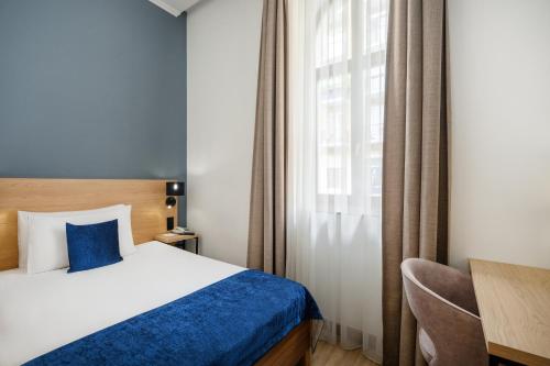 Habitación Individual Confort del hotel Bristol Budapest. Foto 1