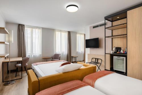 Habitación Triple Confort del hotel Bristol Budapest. Foto 2