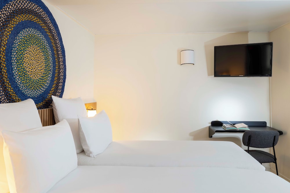 Habitación con 2 camas individuales del hotel Korner Sorbone. Foto 1