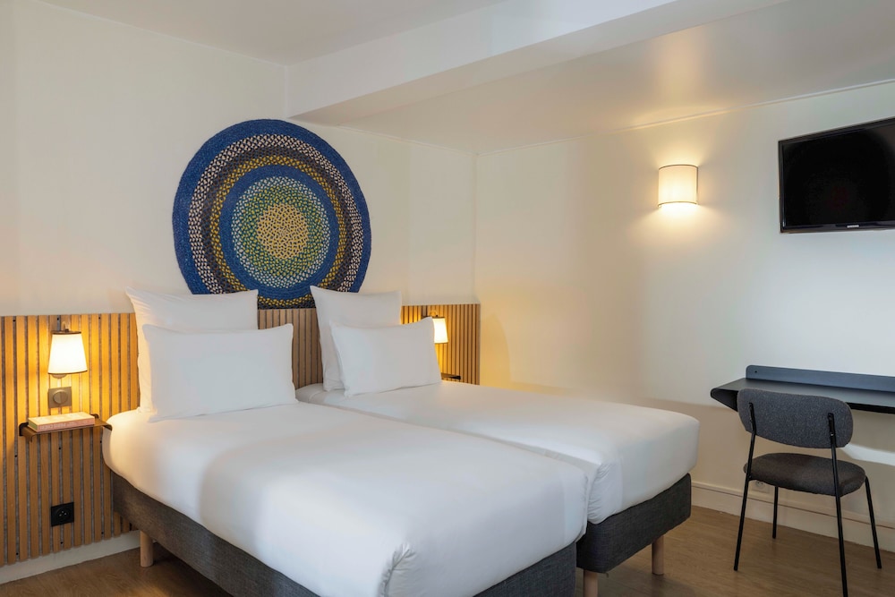 Habitación con 2 camas individuales del hotel Korner Sorbone. Foto 2