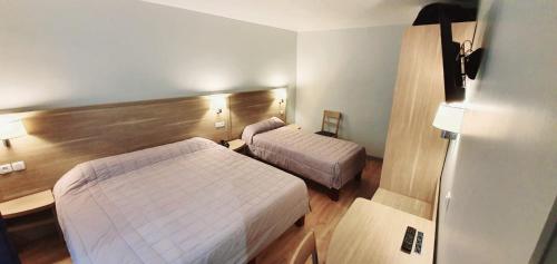 Habitación Triple del hotel Hôtel des Pyrénées - Nation