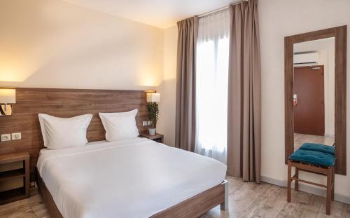Habitación Triple del hotel La Perle Montparnasse