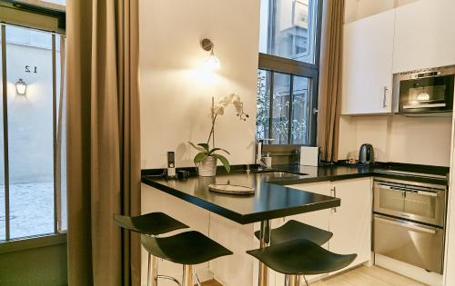 Apartamento - Planta baja del hotel Apartments du Louvre - Le Marais. Foto 2