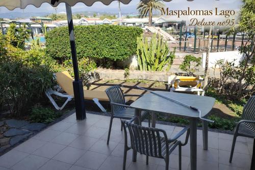 Bungalow con vistas a la piscina del hotel Maspalomas Lago Canary Sunset. Foto 3