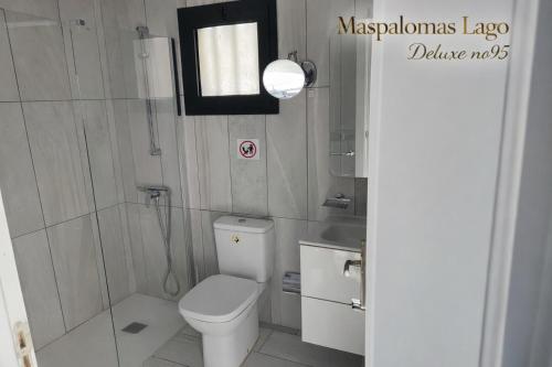 Bungalow con vistas a la piscina del hotel Maspalomas Lago Canary Sunset. Foto 5