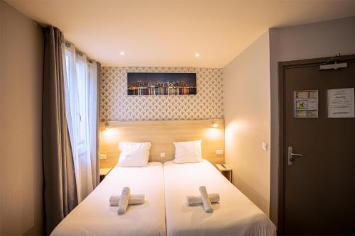 Habitación Doble Estándar - 2 camas del hotel Hôtel Aix Europe