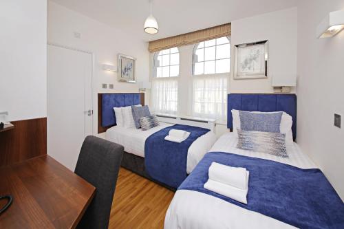 Habitación Doble Clásica - 2 camas del hotel Imperial Guest House. Foto 1