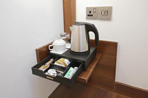 Habitación Individual Clásica con aseo privado y ducha compartida del hotel Imperial Guest House