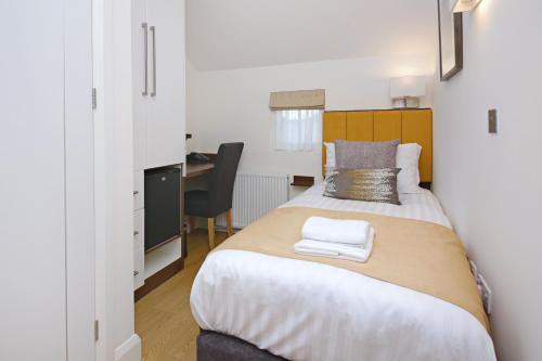 Habitación Individual con ducha y aseo compartidos del hotel Imperial Guest House